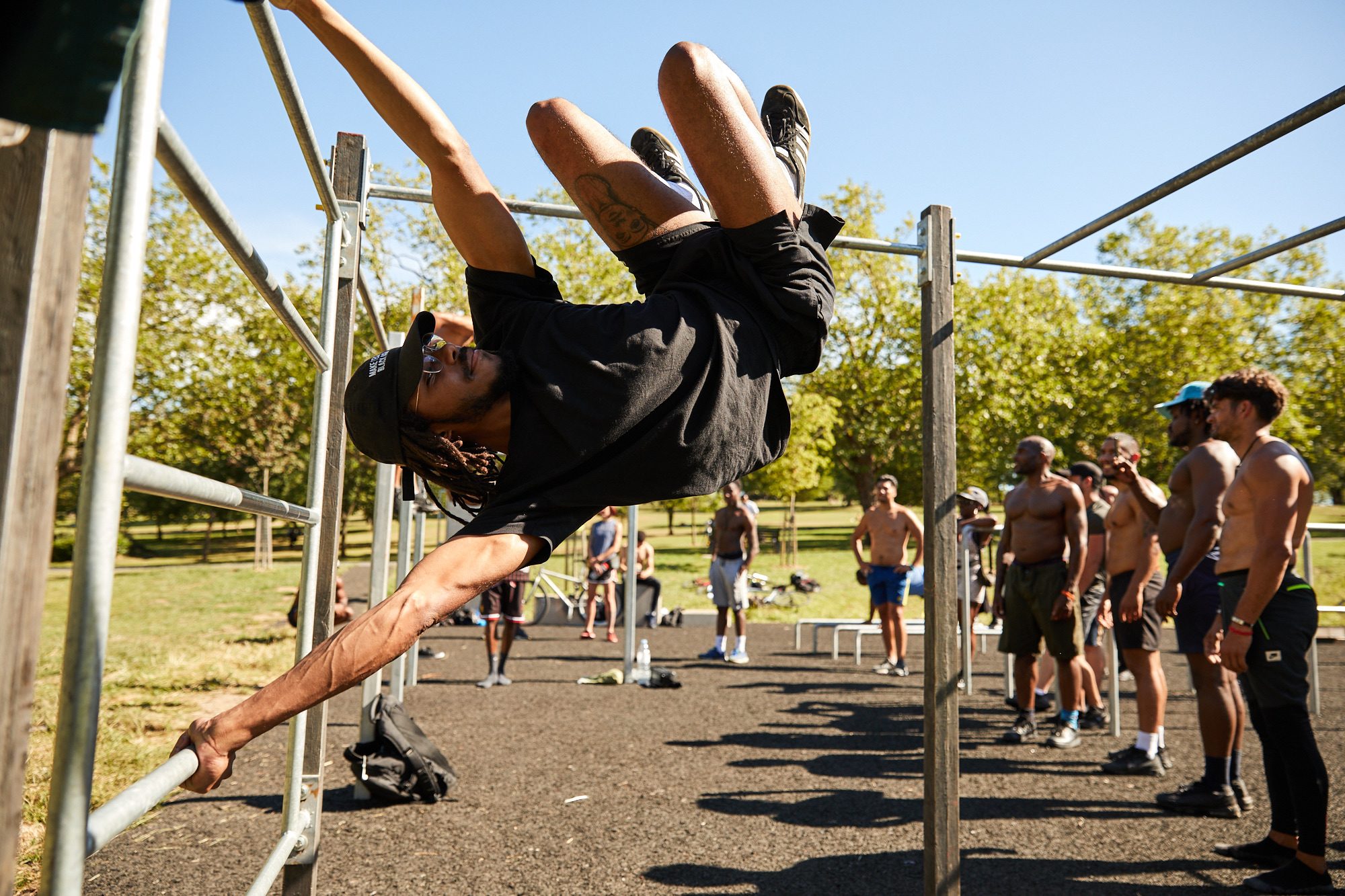 The community gathered around the bars at a free Steel Warriors class
