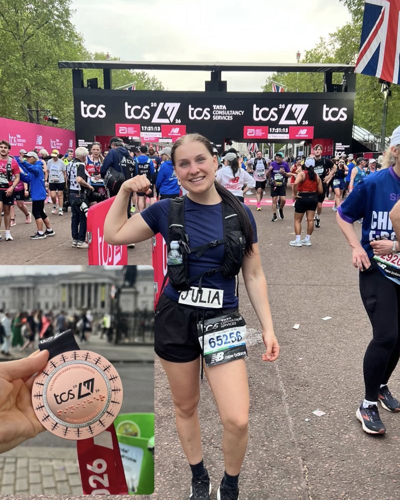 A Steel Warriors runner at the finish of the 2026 TCS London Marathon, with her medal